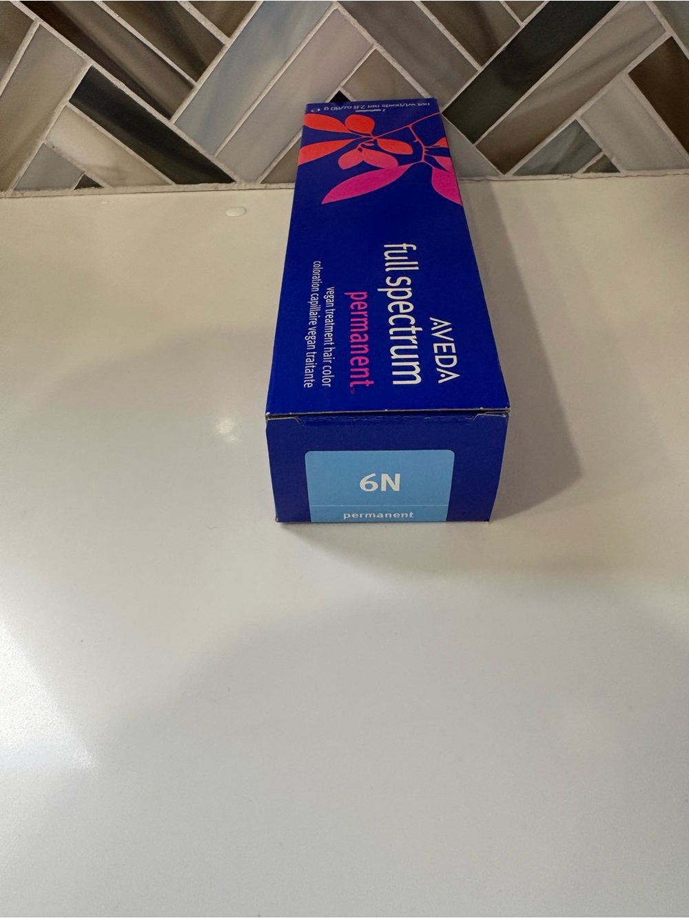 AVEDA full spectrum permanent hair color 6N - deep blue with bright pink accents